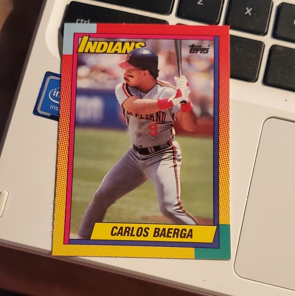 Carlos Baerga baseball card listed on Poshmark, showcasing a vintage design with team logos and player statistics